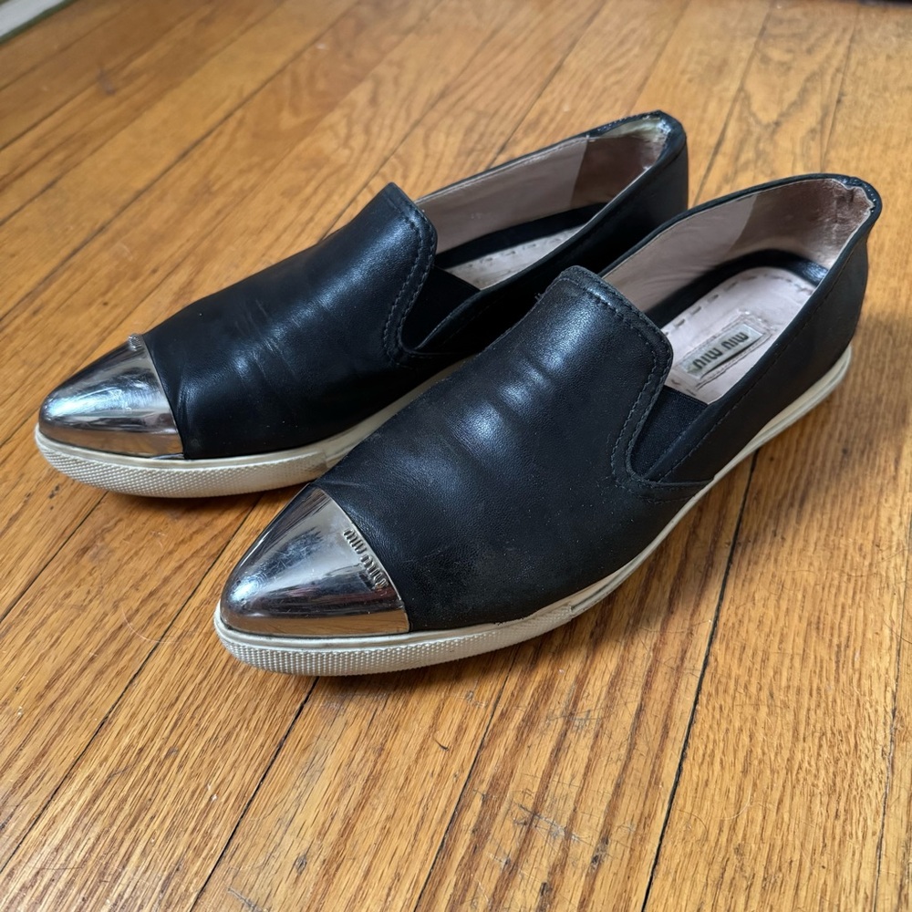MIU MIU Black Leather and Metal Toe Loafers